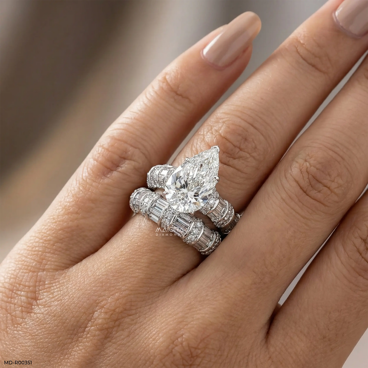 Empire Pear Solitaire Diamond Ring