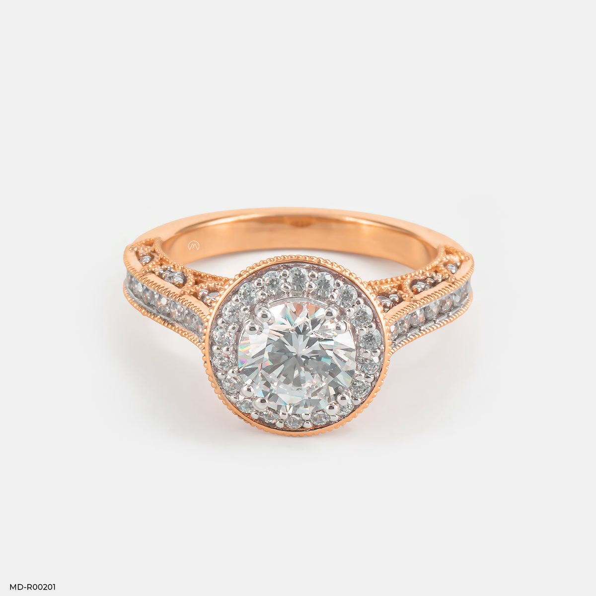 The Round Brilliant Vintage Halo Ring