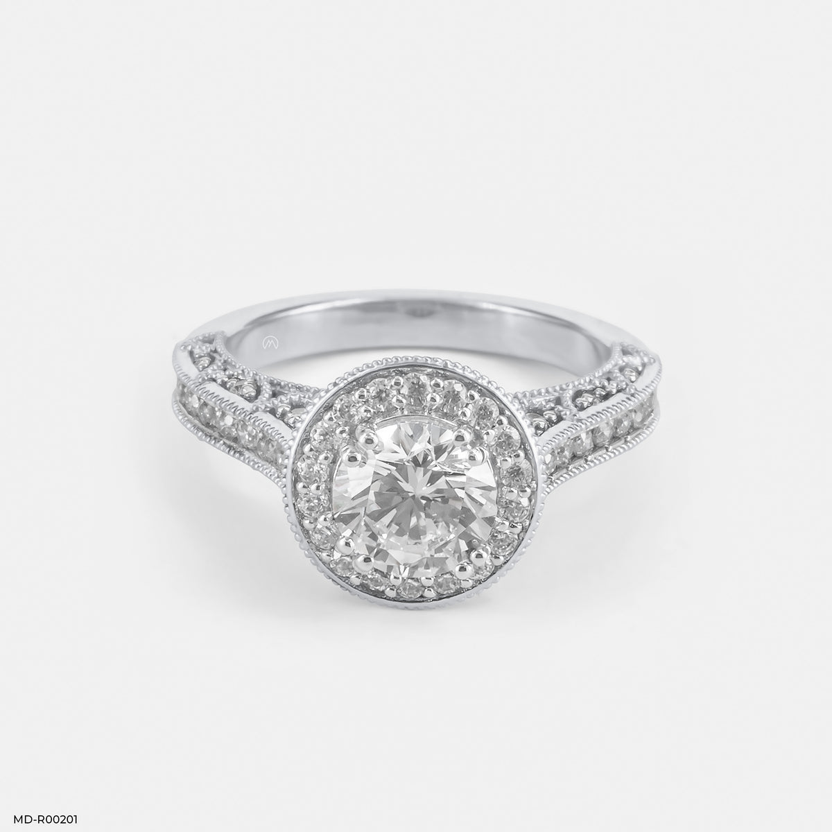 The Round Brilliant Vintage Halo Ring