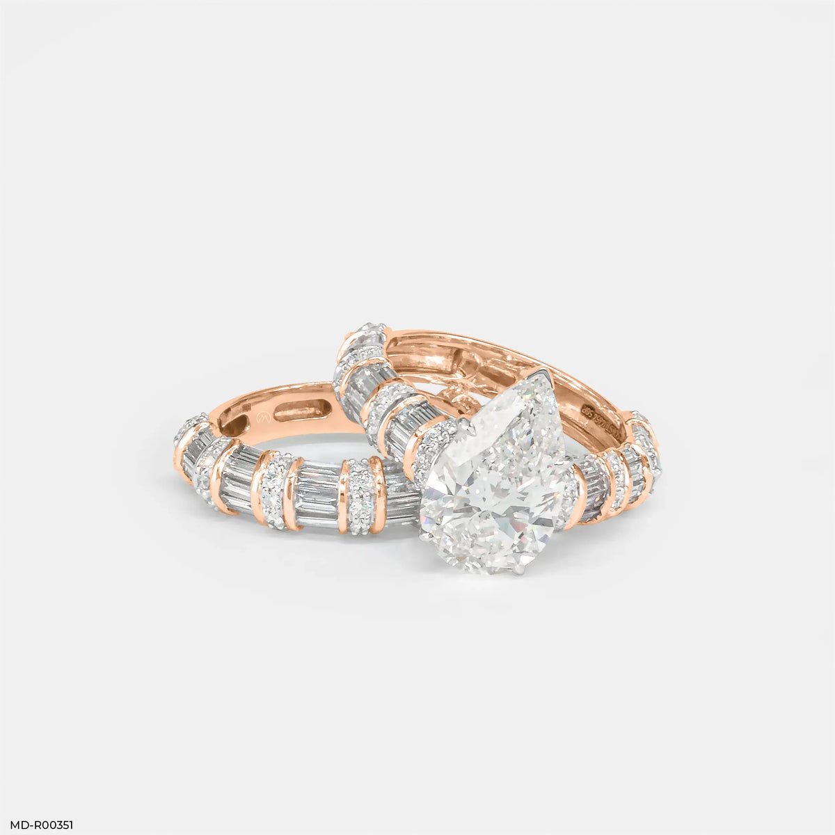 Empire Pear Solitaire Diamond Ring