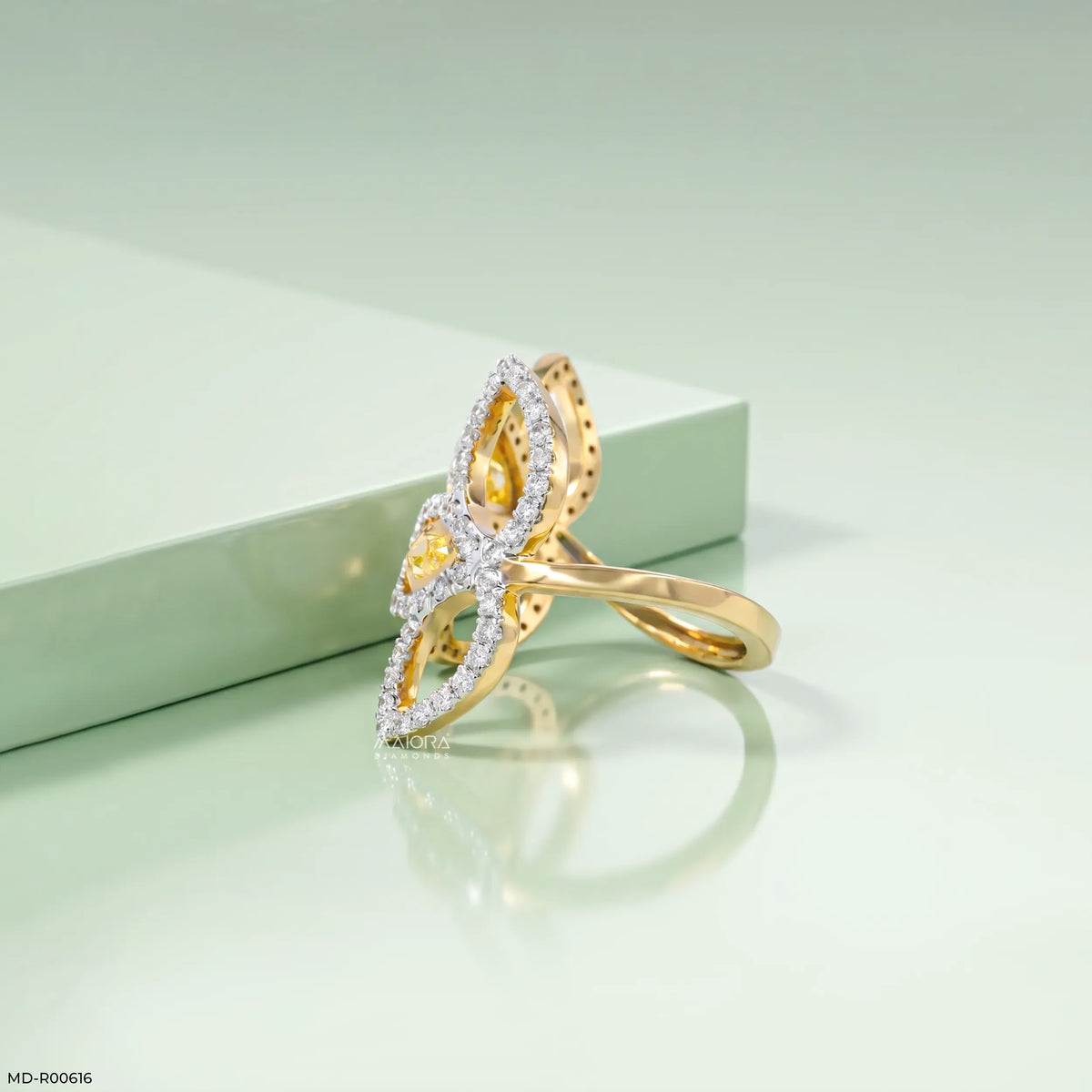 0.95 Carat Nova liner Oval Yellow Color Diamond Ring