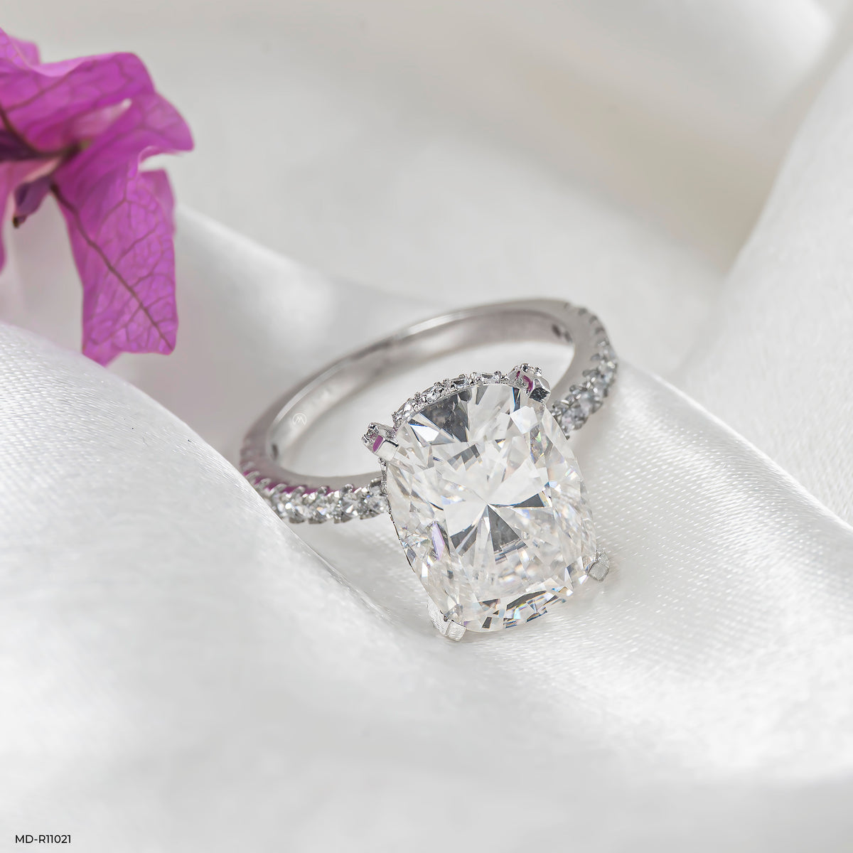 Hidden Halo Oval Solitaire Rings
