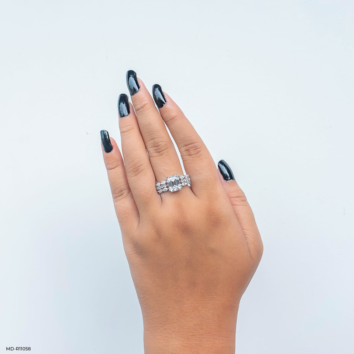 Regal Emerald Solitaire Diamond Ring