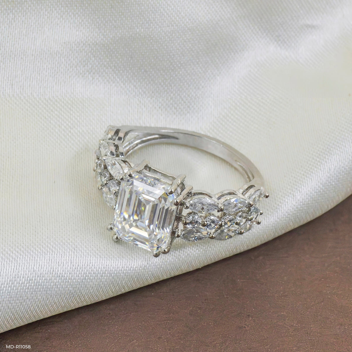 Regal Emerald Solitaire Diamond Ring