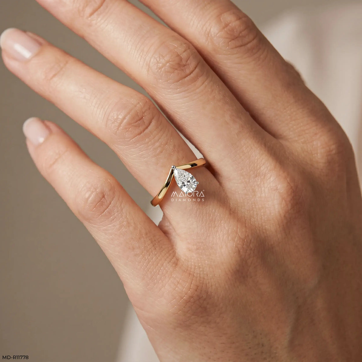 Simply Solitaire Pear Vanki Diamond Ring